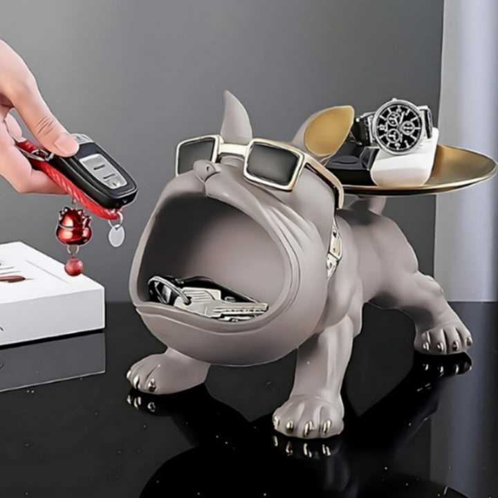 Green bulldog figurine with gold sunglasses and tray on modern coffee table