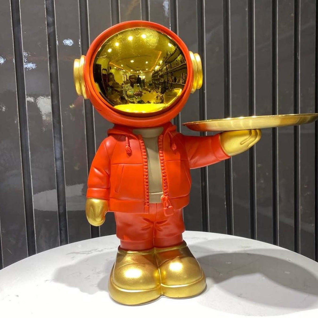 Decorative astronaut figure tray holder for tabletop or entryway