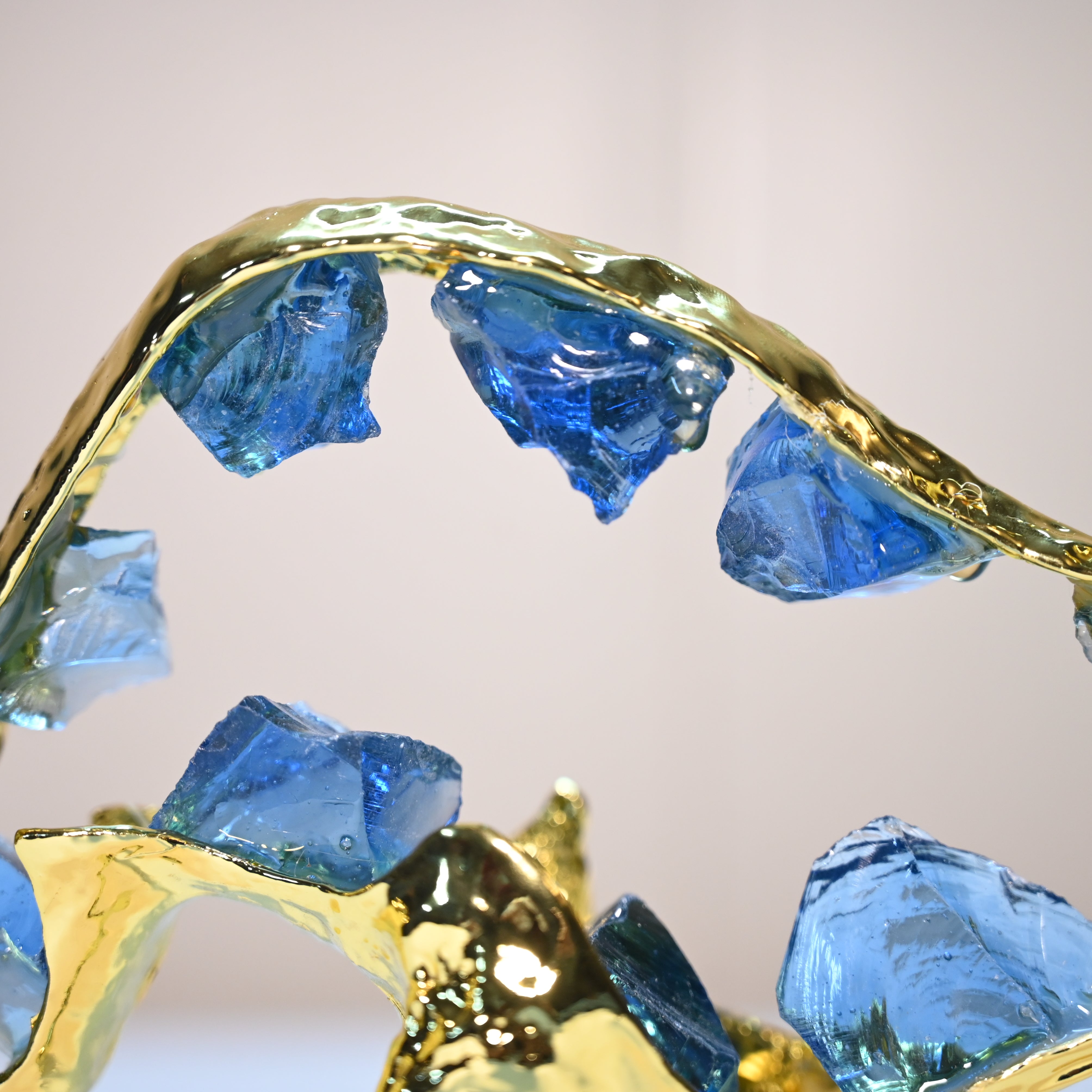 Golden bull showpiece with blue crystals for luxury home decor