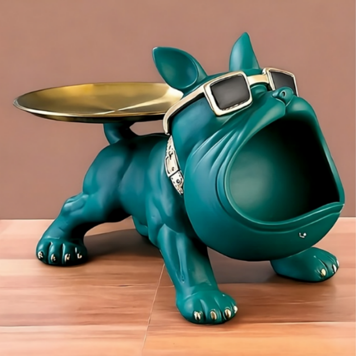 Whimsical green bulldog ornament with gold tray on center table