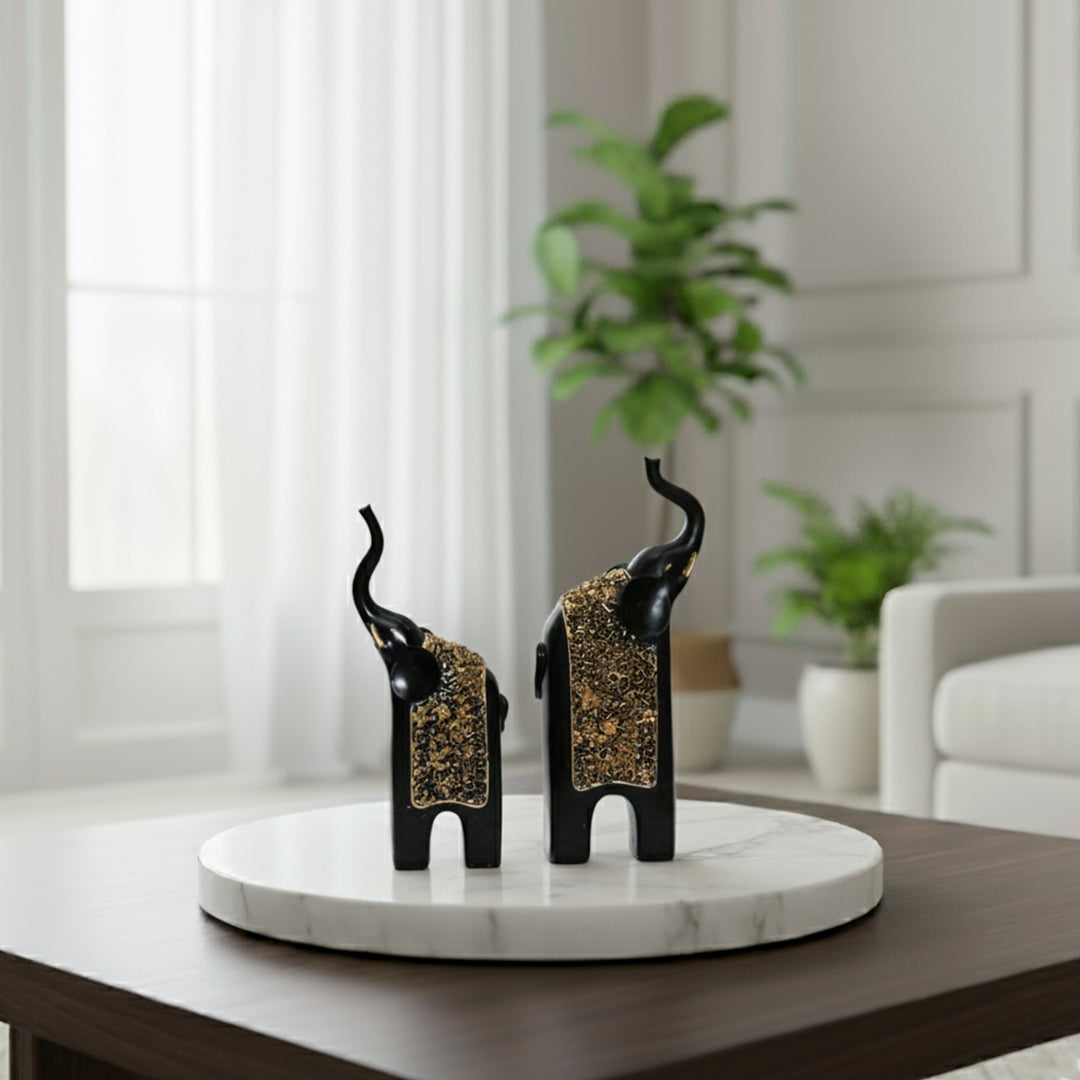 Black and gold elephant pair for home and office decor by Divoma