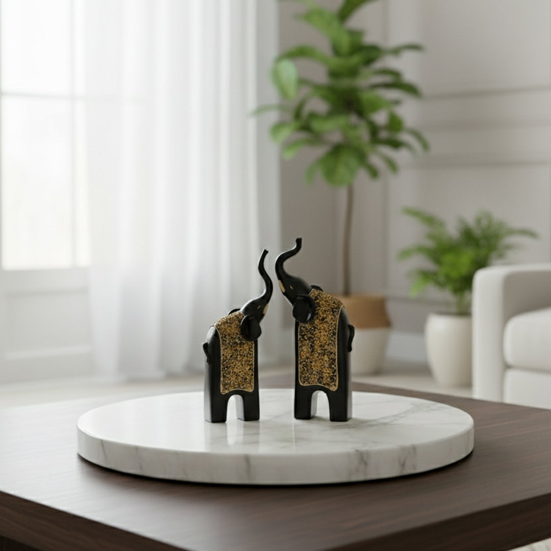 Elegant black and gold elephant pair for home decor