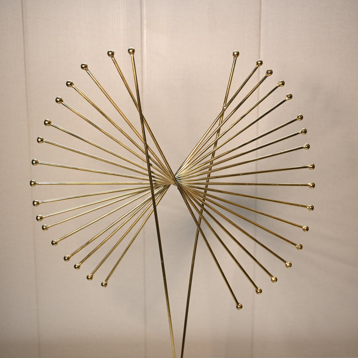 Stylish golden metal decor piece for modern interiors
