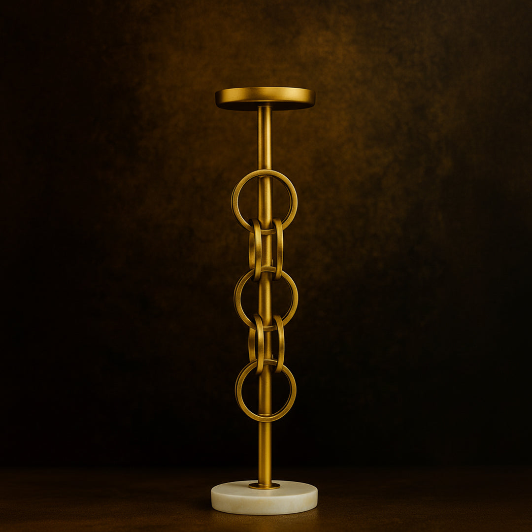 Golden chain design metal candle holder with white marble base, luxury modern home decor item by Divoma.
