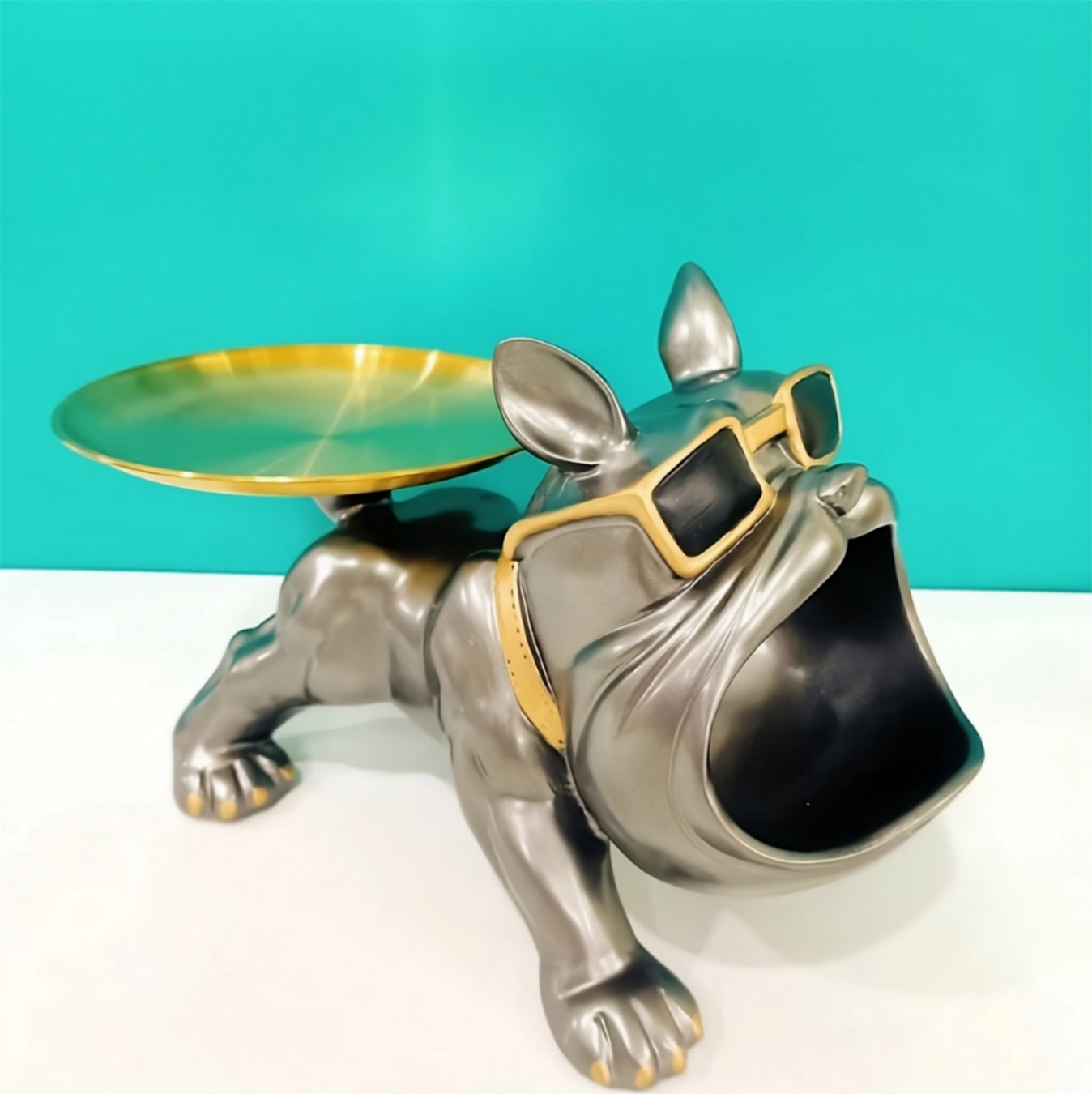 Luxury green dog-shaped candy dish or valet tray in contemporary living room