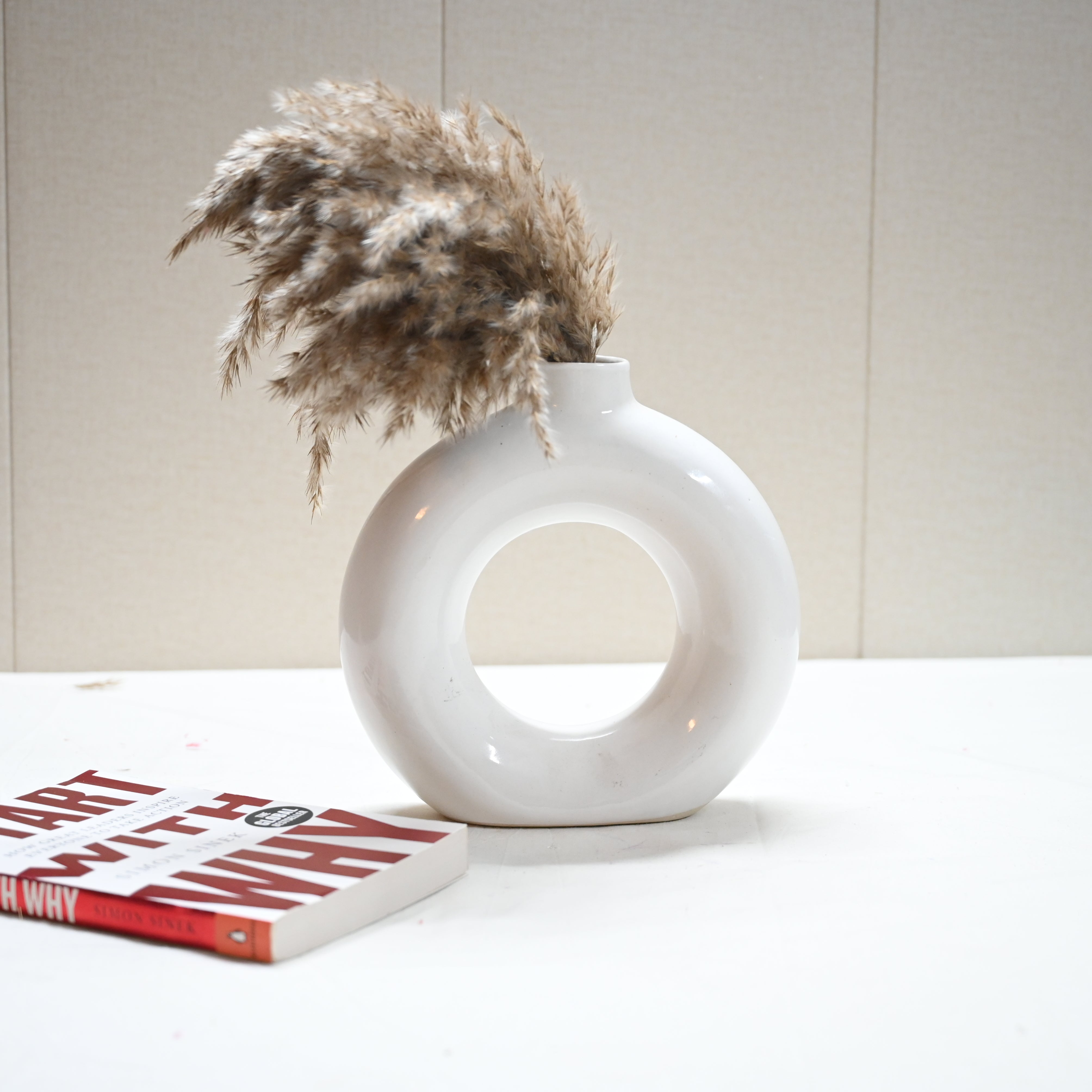 Contemporary decorative vase with dried floral stems