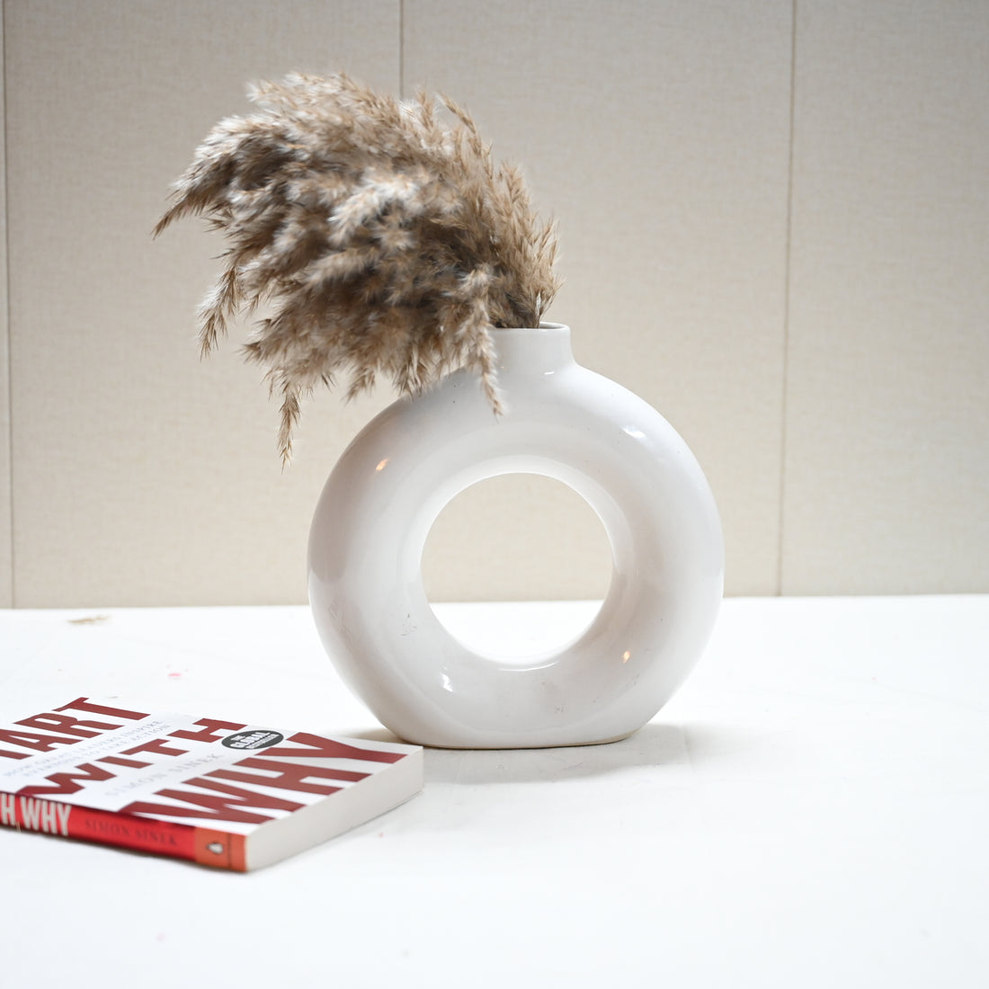 Contemporary decorative vase with dried floral stems