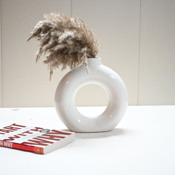 Contemporary decorative vase with dried floral stems