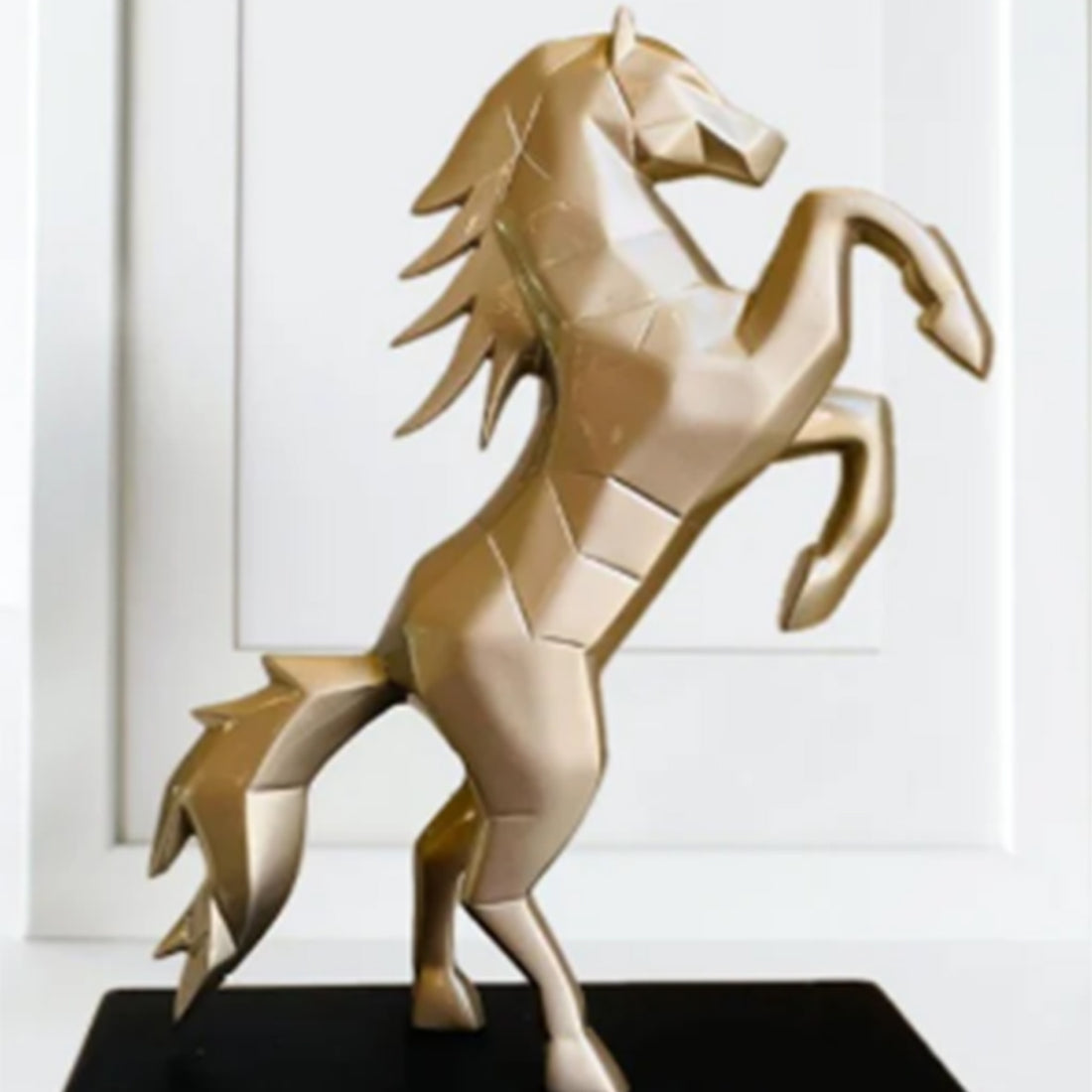 Luxury golden horse sculpture symbolizing strength and success, ideal for living room decoration.