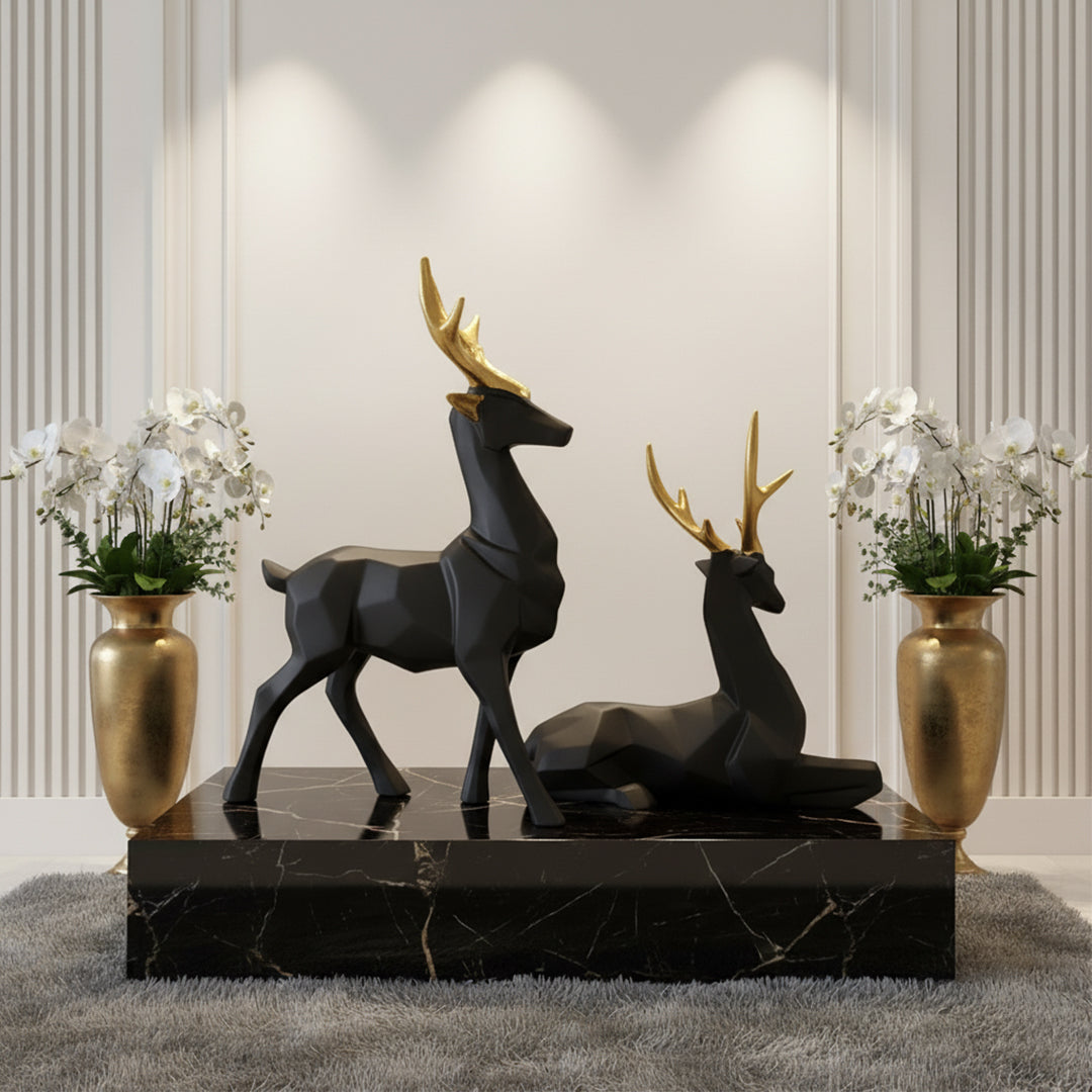 Stylish black and gold deer sculpture for living room decoration and luxury home decor accent.