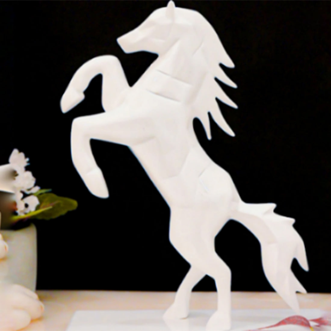 Decorative white horse sculpture for home and office interiors, adding luxury and charm.